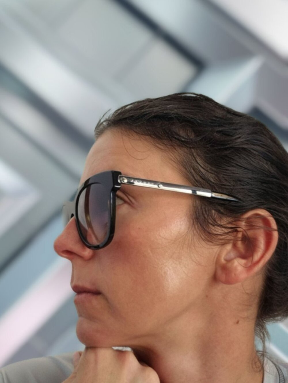 Giorgio Armani with A/X sunglass bag